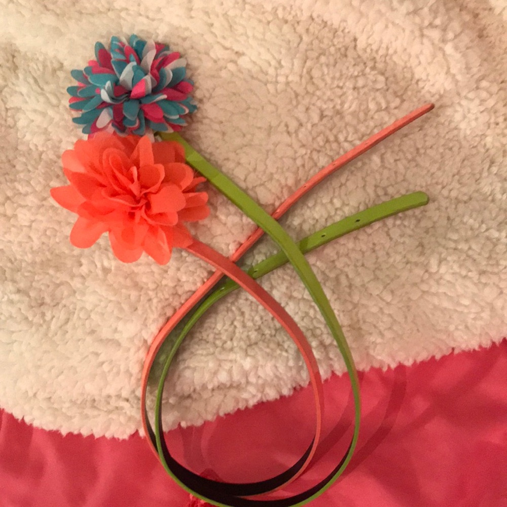 Two belts size 6/7 girls with fabric flower on end